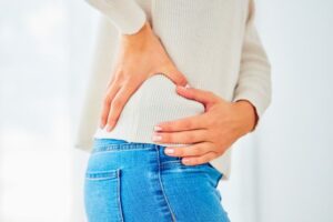 Woman who's back pain cause hip pain